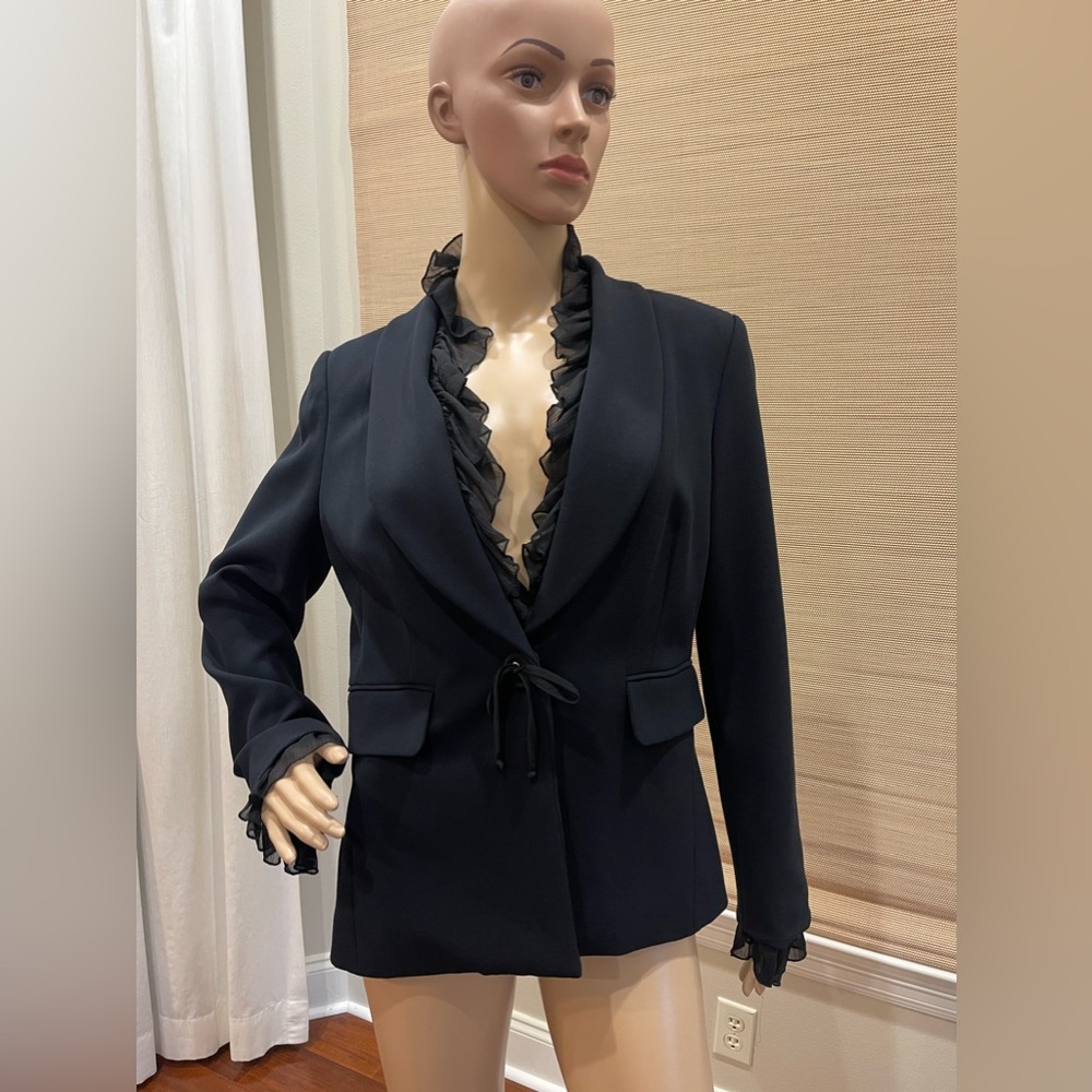 Josephinee Chaus ruffled black blazer. Snap one button closure with tie. Size 6